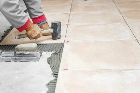 Floor tile installation Stock Photos