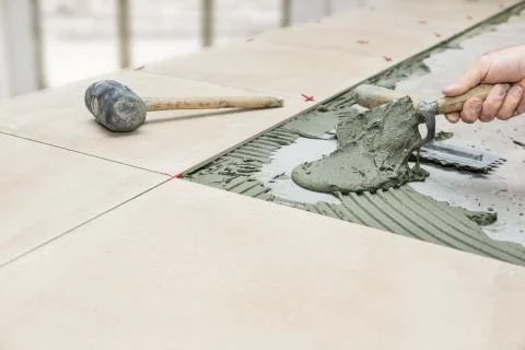 Floor tile installation Stock Photos
