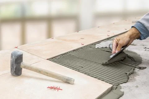 Floor tile installation Stock Photos