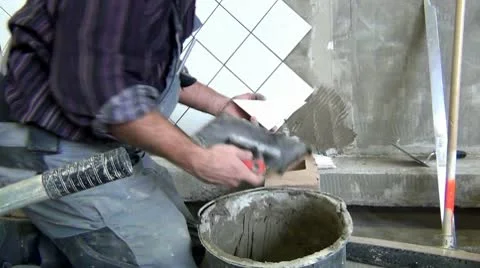 Floor tiler Stock Footage 10792836
