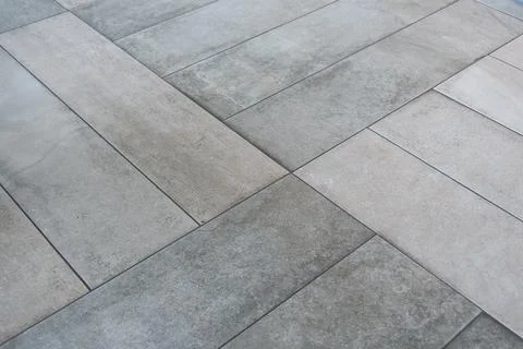 Floor tiles arranged in a structured pattern Stock Photos