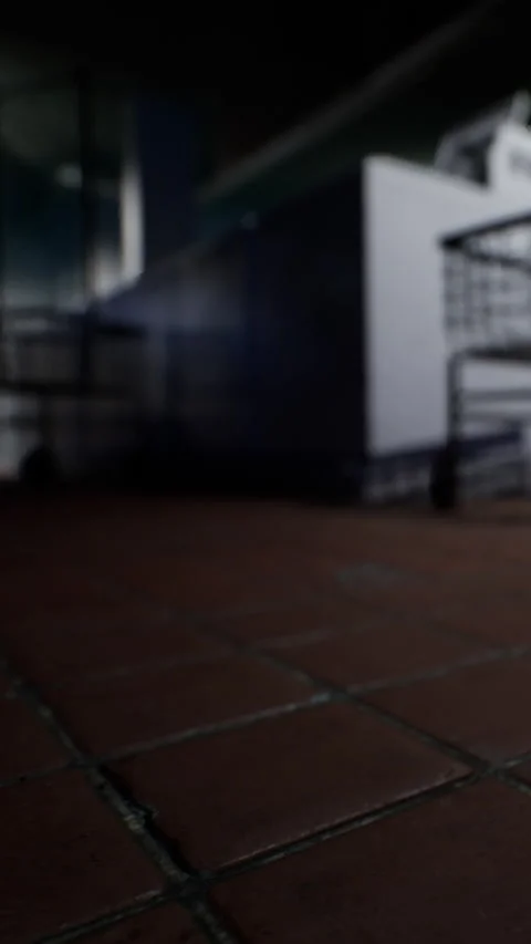 Floor tiles in a kitchen with low light and shadows visible on the surface Stock Footage 337999560