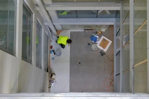 Floor tiling and fitting service Stock Photos