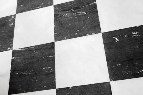 Floor tiling with classical black and white checker pattern Stockfoto's