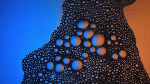 Floping multicolored bubbles. Top view. Close up. Stock Footage 165170438