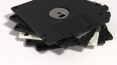 Floppy 3,5 disks turning macro Stock Footage 33717127