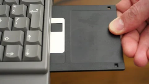 Floppy disk inserted in laptop Stock Footage 156047004