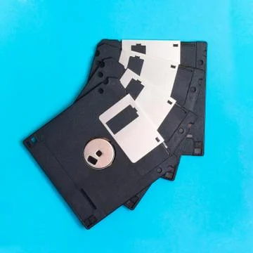 Floppy disk magnetic computer data storage support on a blue bac 写真素材