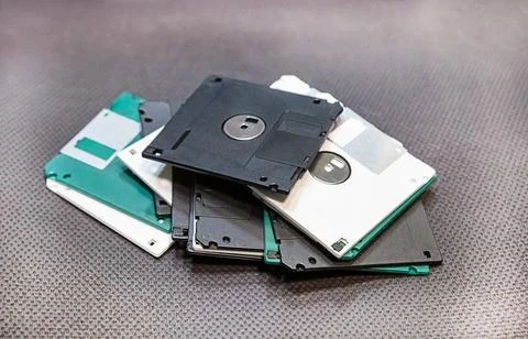 Floppy disk obsolete storage medium, multi-colored floppy disks close-up Foto stock