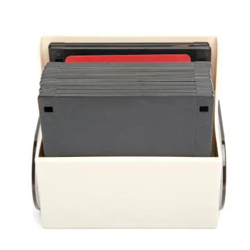 Floppy disk organizer case filled with diskettes, isolated Foto stock