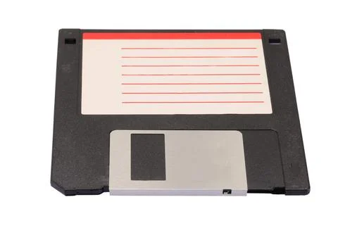 Floppy disk used to save computer data in the 90s on a white background Foto stock