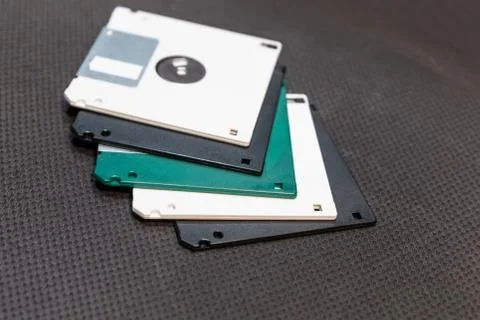 Floppy disk white and black lies in a stack on a dark background engineering Foto stock
