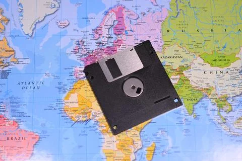 Floppy disk on the world map Stock Photos