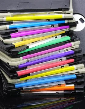 Floppy disks used to save computer data in the 90s Foto stock