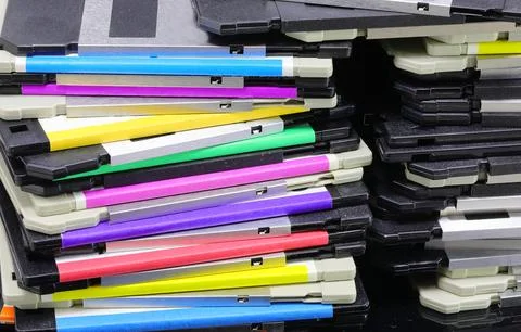 Floppy disks used to save computer data in the 90s Stock Photos