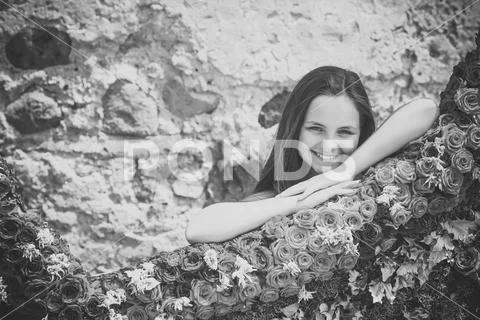Floral design and little child, floristic, floral shop Stock Photos