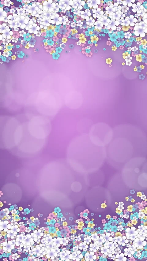 Floral design. Floating colored spring frame of flowers on pink background. Loop Stock Footage 302927994