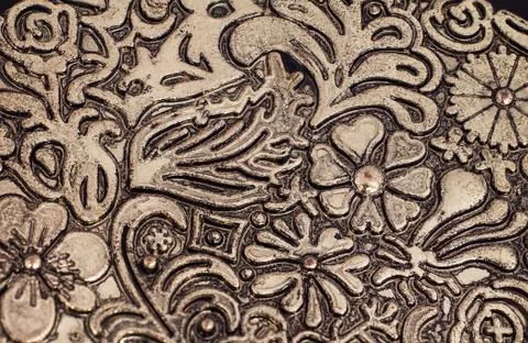 Floral pattern on brass plate Foto stock