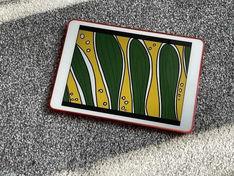 Floral pattern illustration on screen of a digital tablet Stock Photos