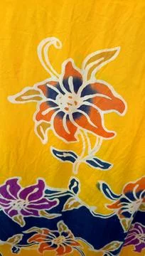 Floral Patterned Batik with a yellow background 스톡 사진