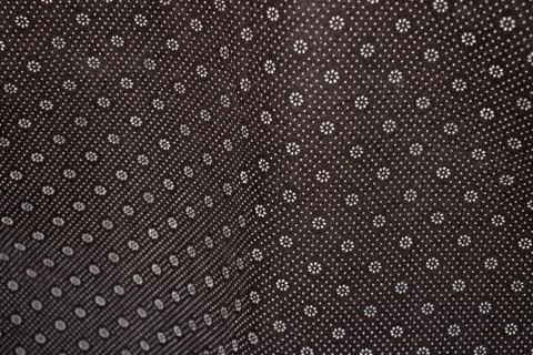 Floral round fabric pattern with dots brown color Stock Photos