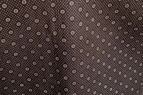Floral round fabric pattern with dots brown color 스톡 사진