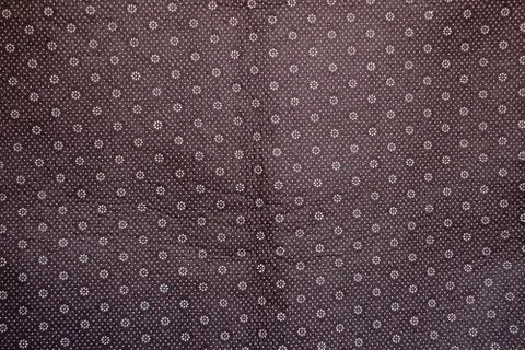 Floral round fabric pattern with dots brown color Stock Photos