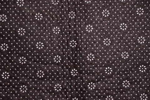 Floral round fabric pattern with dots brown color Stock Photos