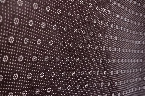 Floral round fabric pattern with dots brown color Stock Photos