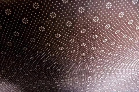 Floral round fabric pattern with dots brown color 写真素材