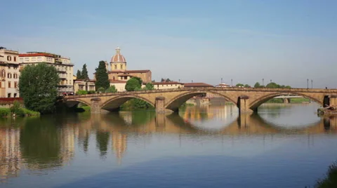 Florence, bridge through the river Arno is reflected in water Stock Footage 50905546