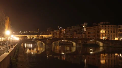 Florence historic bridge with water reflection in the river at night. Stock Footage 221074302