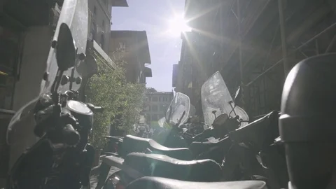 Florence Motorbikes in the Sun 4K Stock Footage 76672535