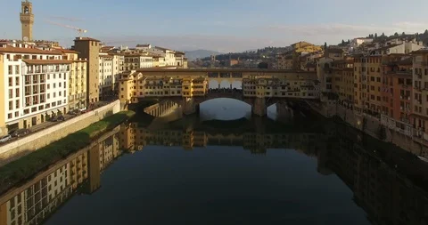 Florence's oldest bridge built at the most narrow part of the Arno River. Italy Stock Footage 121806176
