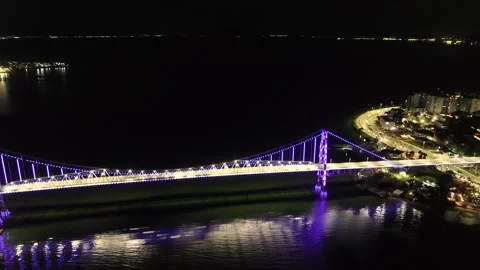 Florianópolis at Night, Hercílio Luz Bridge Illuminated in Purple Lights Over 스톡 동영상 344998626