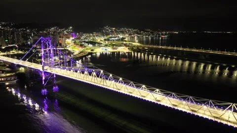 Florianópolis at Night, Hercílio Luz Bridge Illuminated in Purple Lights Over Video stock 344998702