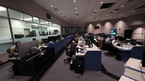 FLORIDA - 1.27.2026 - US Space Force Guardians monitor a rocket launch at the Stock Footage 338340976