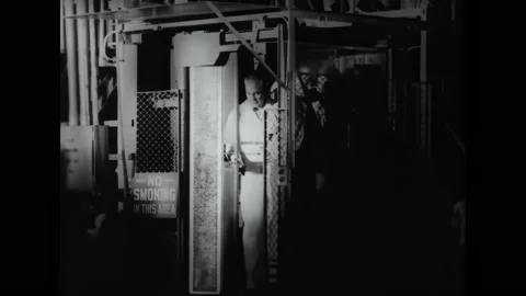 FLORIDA - 1961 - An elevator brings Gus Grissom up to the Liberty Bell 7 at Cape Stock Footage 316408699