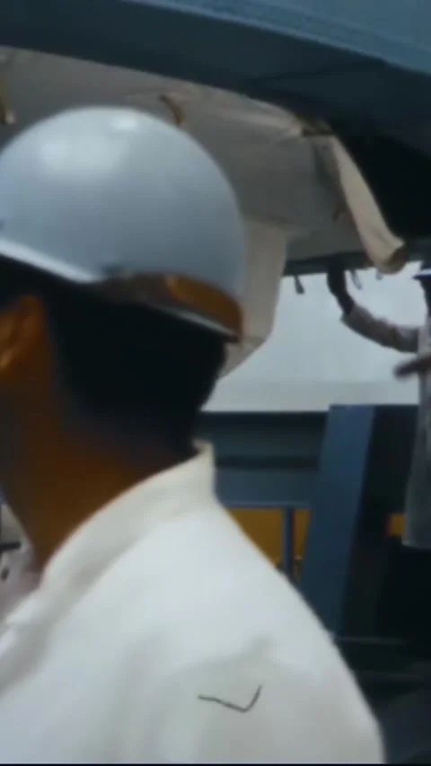 FLORIDA - 1967 - NASA engineers help lower a command service module onto a Stock Footage 342654731
