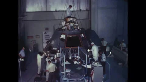 FLORIDA - 1967 - NASA engineers inspect all angles of the Apollo 1 command Stock Footage 340651484