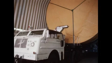 FLORIDA - 1967 - Prime mover being hooked up to S-II stage at NASA's Kennedy Stock Footage 340589396