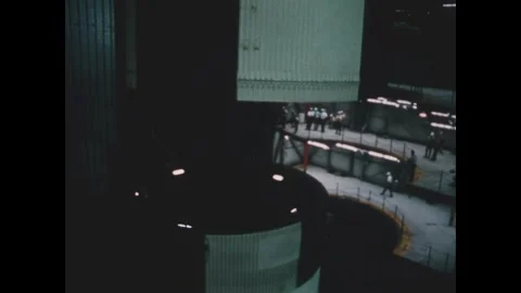 FLORIDA - 1969 - Apollo 13's S-II stage is lowered onto the S-IC stage at the Stock Footage 340652476