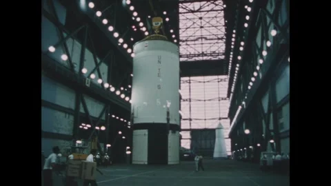 FLORIDA - 1969 - Apollo 13's S-II stage is hoisted up from the floor of the Stock Footage 340652515