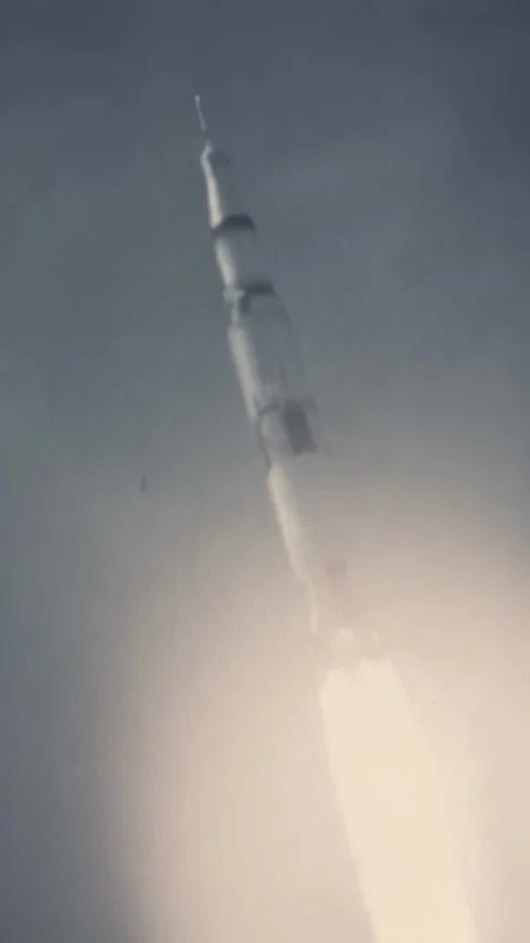 FLORIDA - 1969 - Close-up track of the Apollo 11 spacecraft as it arcs after Stock Footage 340323805