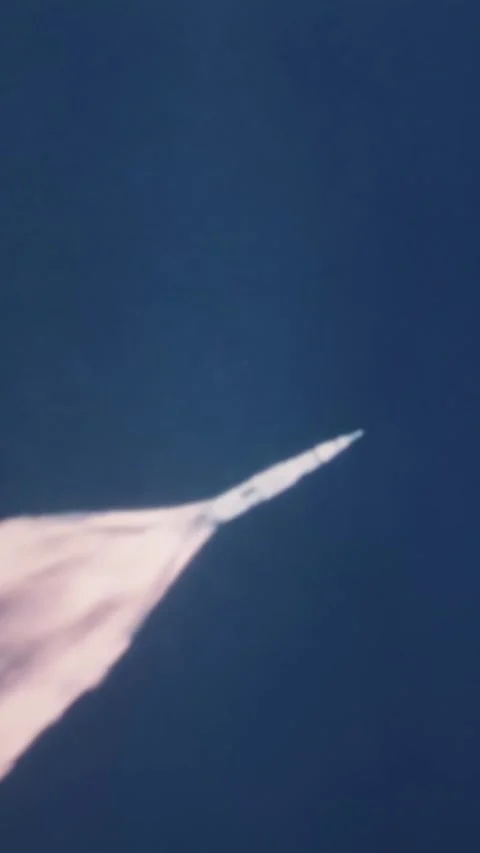 FLORIDA - 1969 - Close-up tracking shot of Apollo 11 as it goes through staging Stock Footage 340321094