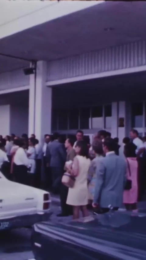 FLORIDA - 1969 - A crowd files into a building for a VIP luncheon held after a Stock Footage 342656219