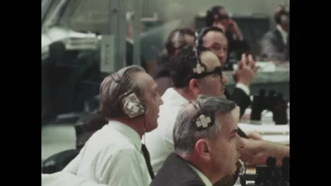 FLORIDA - 1969 - Frank Borman and Vice President Agnew monitor the Apollo 9 Stock Footage 316613166