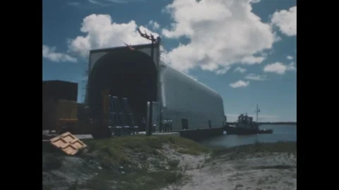 FLORIDA - 1969 - The prime mover backing into the barge at Kennedy Space Center. Stock Footage 340591167