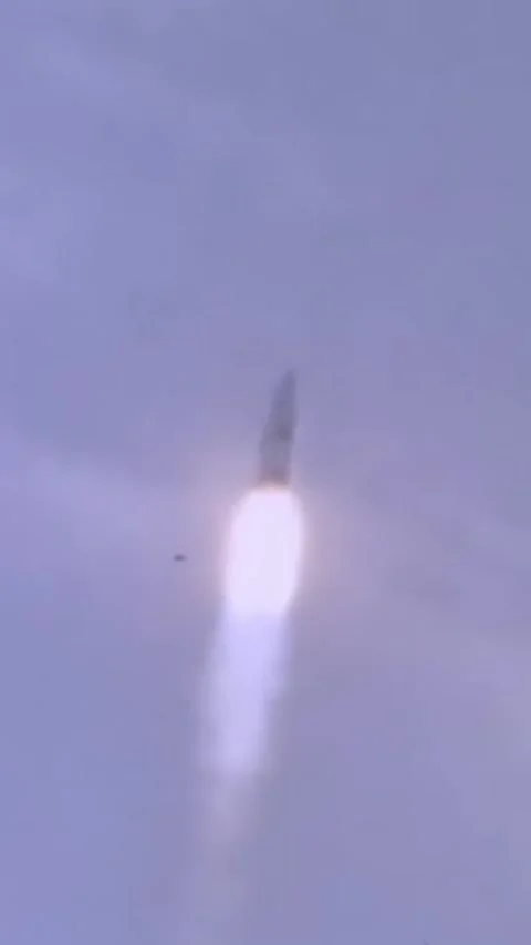 FLORIDA - 1969 - Spectators look on as the Apollo 11 rocket goes through Stock Footage 342237921