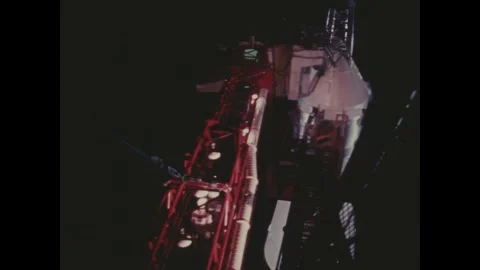 FLORIDA - 1972 - Apollo 13 crew members cross the crew access arm from the Stock Footage 340586908
